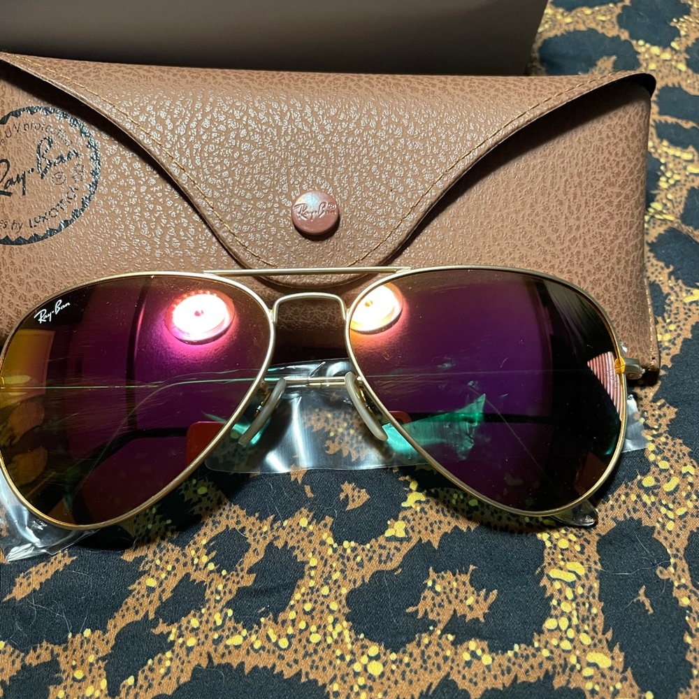 Mirrored pink lenses never worn.